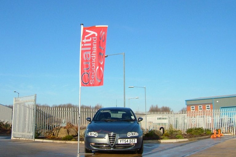 Forecourt Flagpole with blue sky